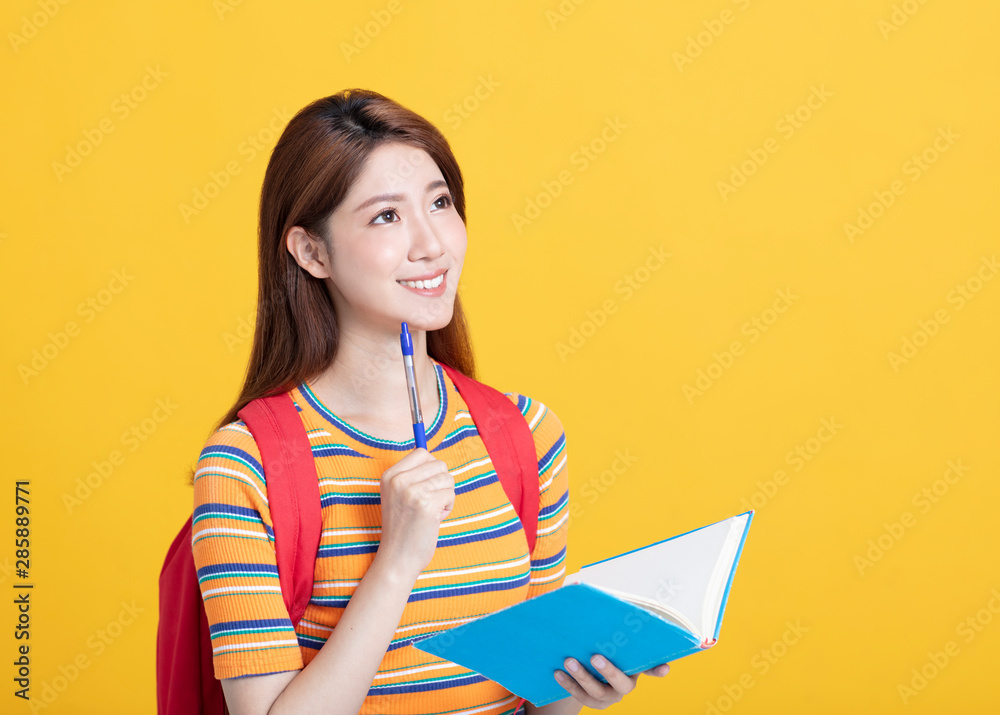 Portrait of beautiful asian student studying and thinking Portrait of beautiful asian student studying and thinking