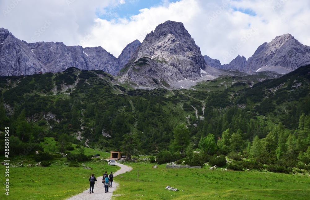 People traveling from Seebensee to Drachensee, an alpine lake  in Tyrol, Austria, near the Zugspitze