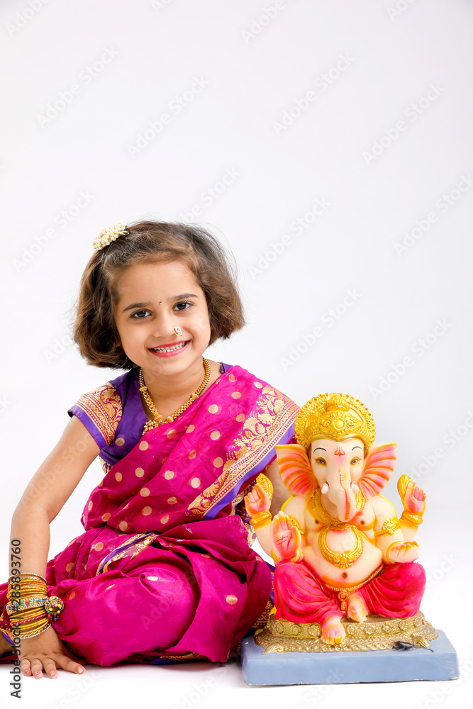 Little indian Girl with lord ganesha Little indian Girl with lord ganesha