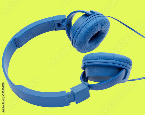 Headphones isolated on yellow background