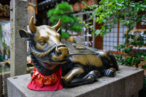 Bronze sculpture of a sacred cow in a Buddhist temple in Kyoto, Japan