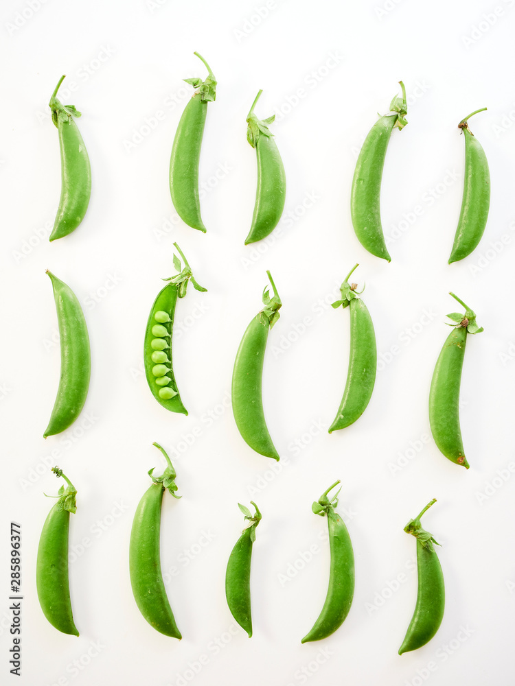 green pea pod on white background green pea pod on white background