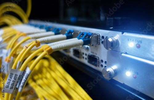 Optic fiber cables connected to data center photo