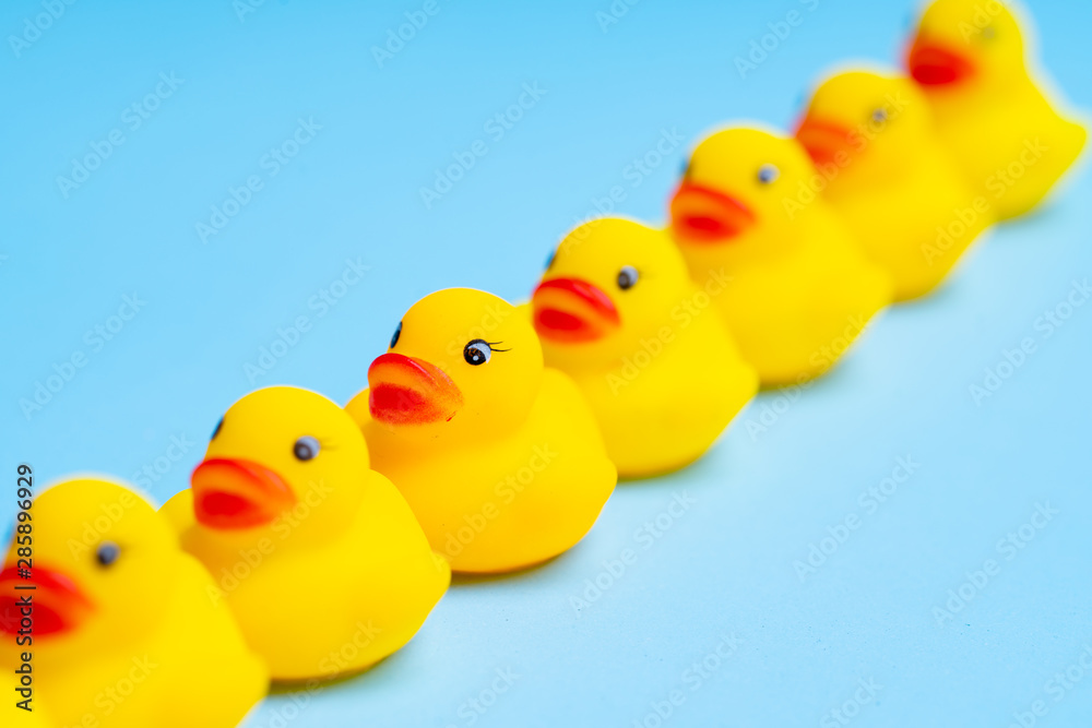 Yellow duck toy for Kid in creative education concept in flat lay
