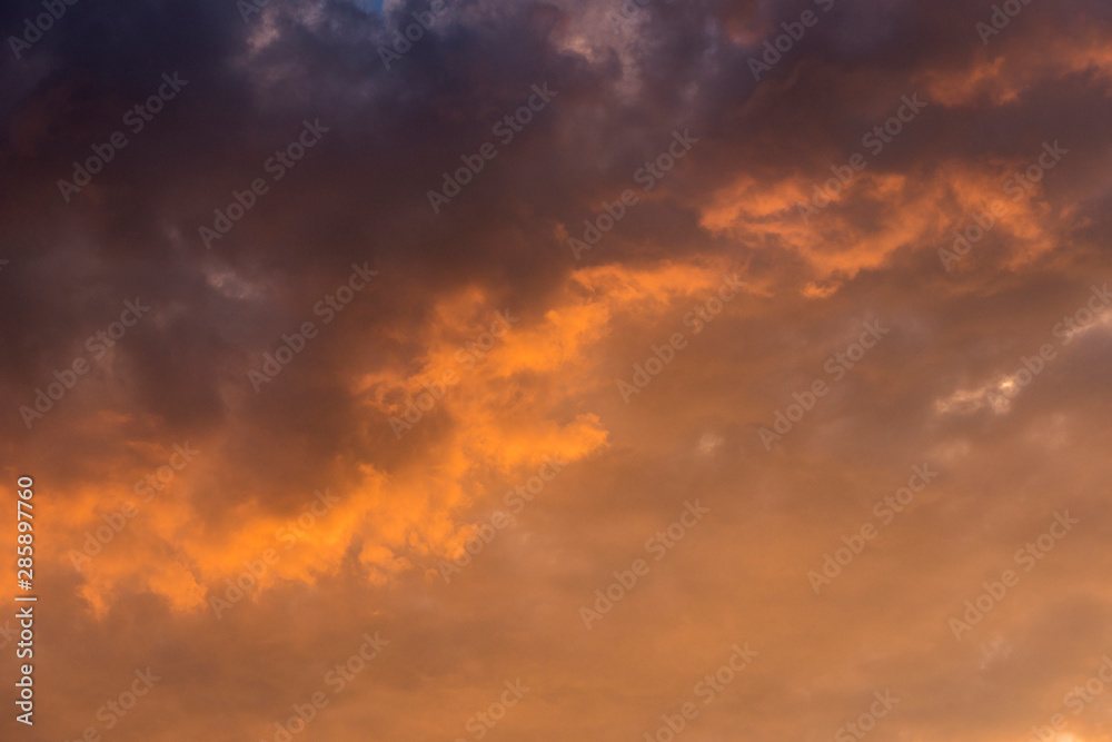 Evening sky with colorful rain clouds