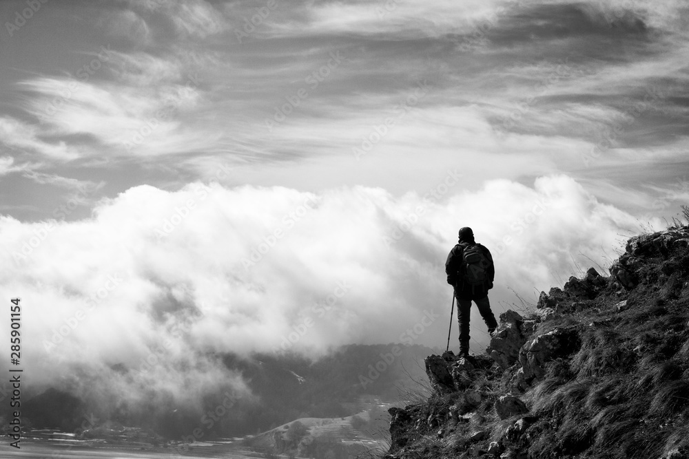 hiker on mountain peak in matese park