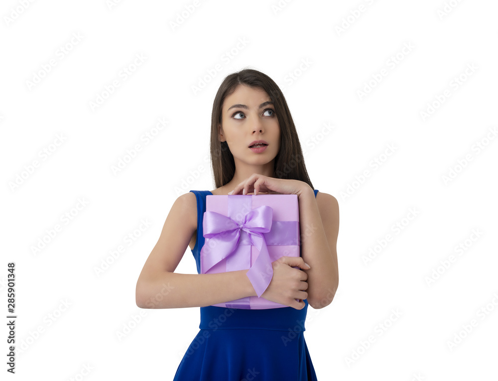 Happy woman think about her received present Happy woman think about her received present