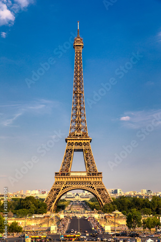 Eiffel tower in summer  Paris  France. Scenic panorama of the Eiffel tower under the blue sky. View of the Eiffel Tower in Paris  France in a beautiful summer day. Paris  France.