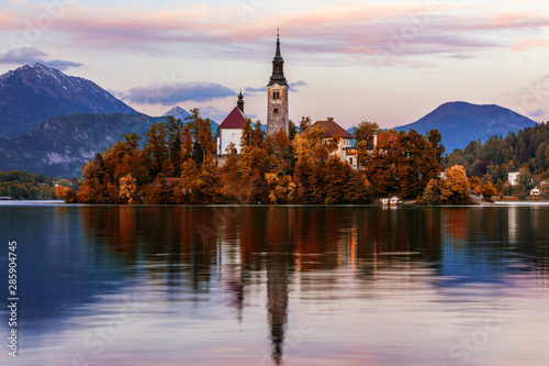 Autumn view on Bled Lake with Pilgrimage Church of the Assumption of Maria. Top view Bled, Slovenia, Europe. Autumn Lake Bled. Lake Bled with small Bled Island during autumn. Bled, Slovenia.
