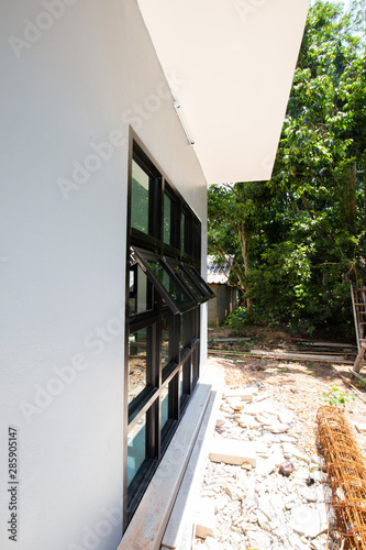 Modern widow glass with black aluminium frame in house