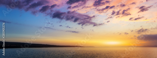 Beautiful sunset or sunrise above the sea. Tropical sunset or sunrise over sea. Colourful sunset or sunrise over water.