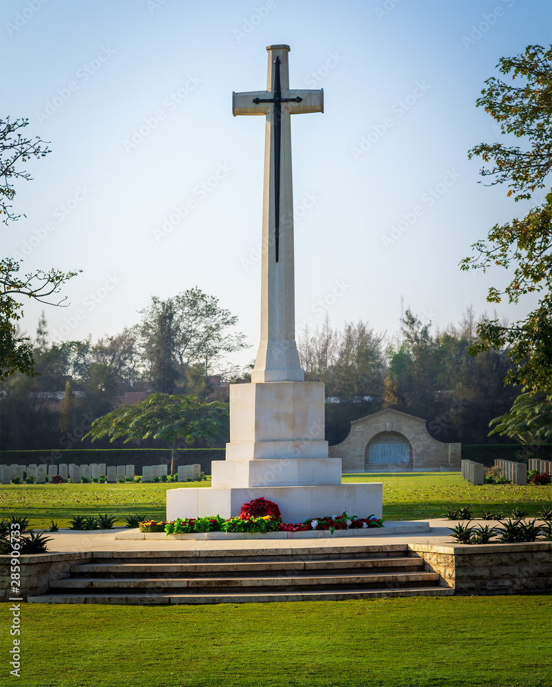 Cross of Sacrifice memorial at the Heliopolis Commonwealth War Cemetery, Cairo, Egypt. the cemetery contains 1742 burials of the Second World War and opened in October 1941 Cross of Sacrifice memorial at the Heliopolis Commonwealth War Cemetery, Cairo, Egypt. the cemetery contains 1742 burials of the Second World War and opened in October 1941