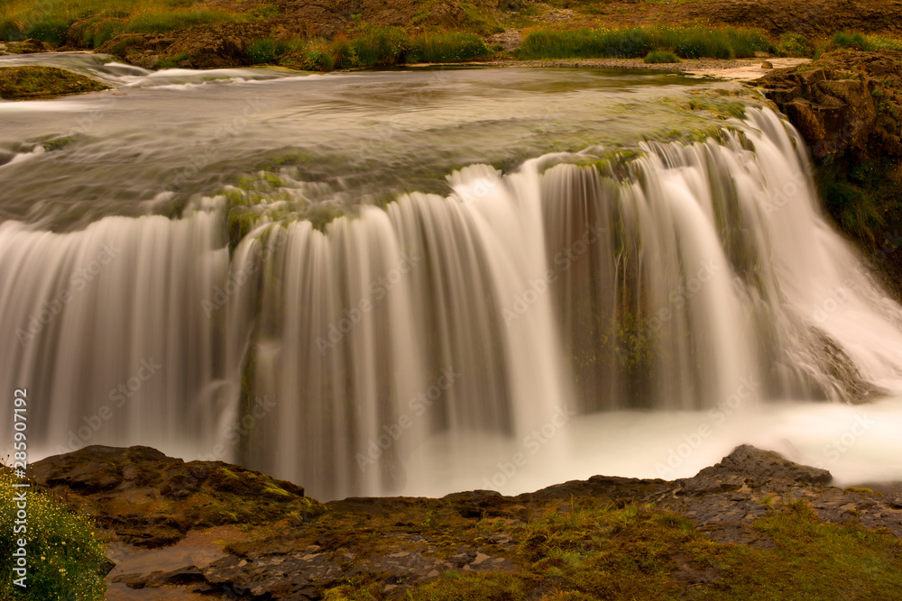 Long exposure photo of waterfall, view of the beautiful waterfall in nothern Iceland, Europe. Long exposure photo of waterfall, view of the beautiful waterfall in nothern Iceland, Europe.