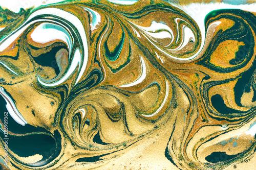 Amazing luxury yellow gold marble background with green and white layers.