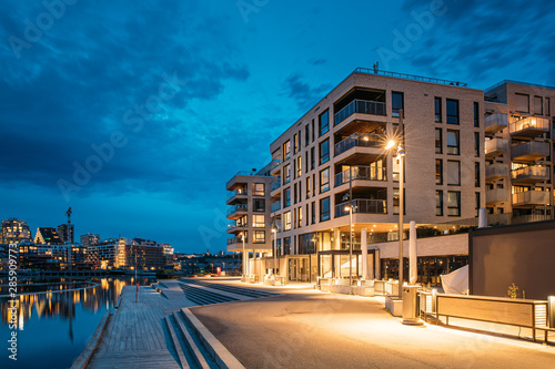 Oslo, Norway. Night View Embankment And Residential Multi-storey House On Sorengkaia Street In Gamle Oslo District. Residential Area In Summer Evening