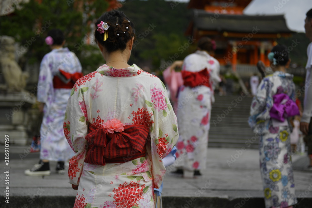 Asian people wearing Japanese traditional kimono clothes at Kiyomizu-dera temple, Kyoto, Japan.