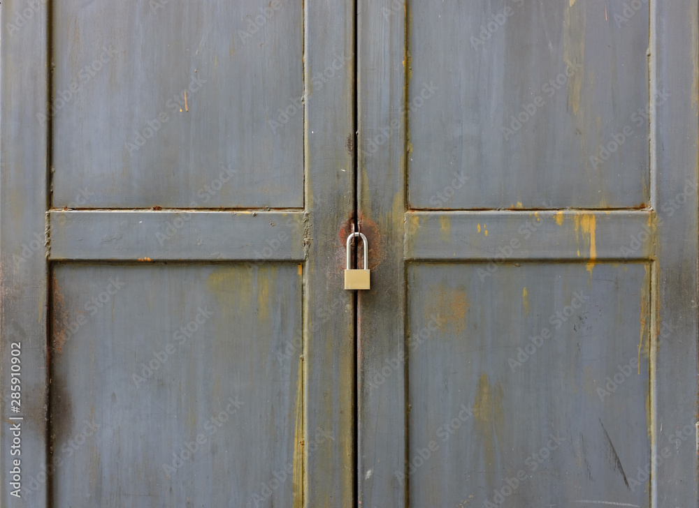 Close up key locked at metal door. Close up key locked at metal door.