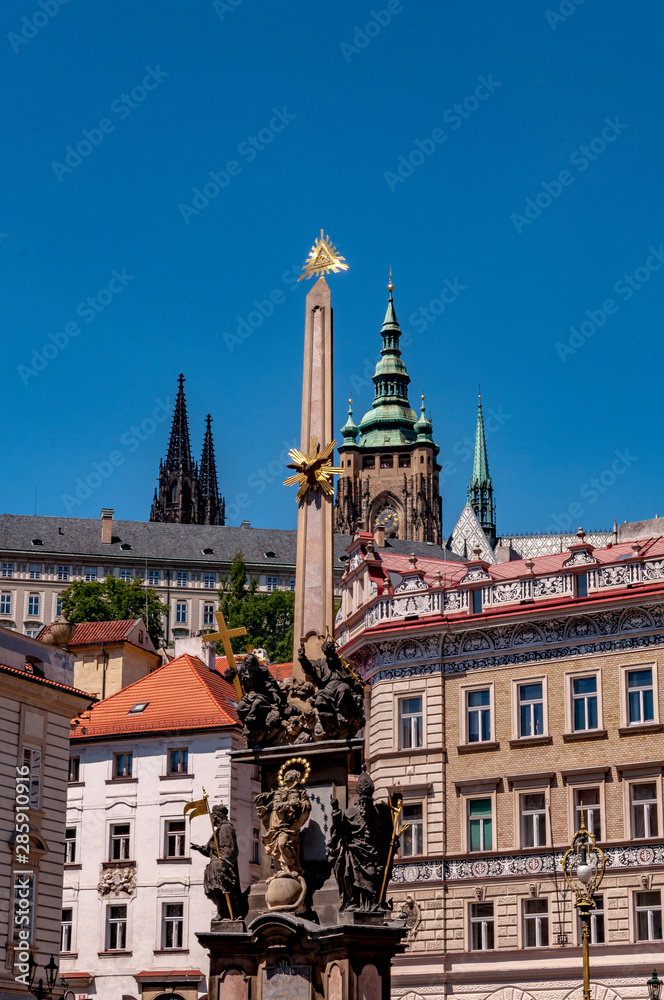 View of Prague Castle from Mala Strana (Lesser Town of Prague) with Holy Trinity Column in front.