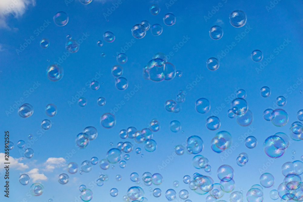 Bubbles floating in the sky on a summers day