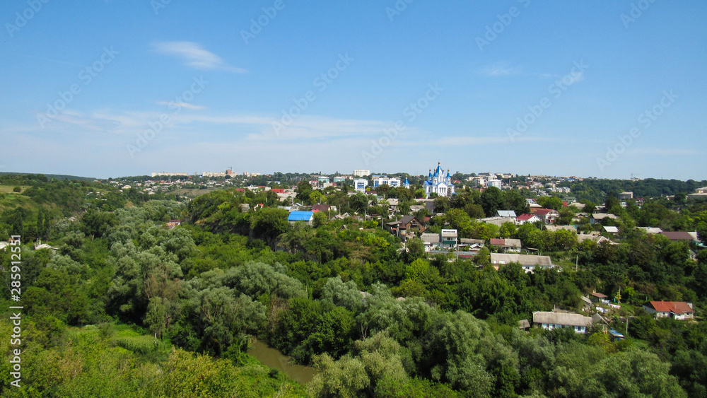 view of the city from the Kamianets-Podilskyi Castle (is a former Ruthenian-Lithuanian castle and a later three-part Polish fortress located in the city of Kamianets-Podilskyi, Ukraine. 07.08.2019 view of the city from the Kamianets-Podilskyi Castle (is a former Ruthenian-Lithuanian castle and a later three-part Polish fortress located in the city of Kamianets-Podilskyi, Ukraine. 07.08.2019