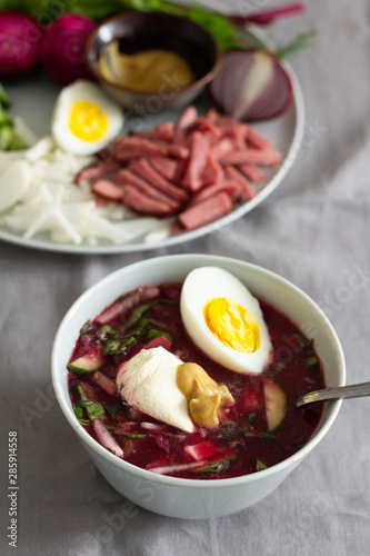 cold summer soup with beets and ingredients close-up