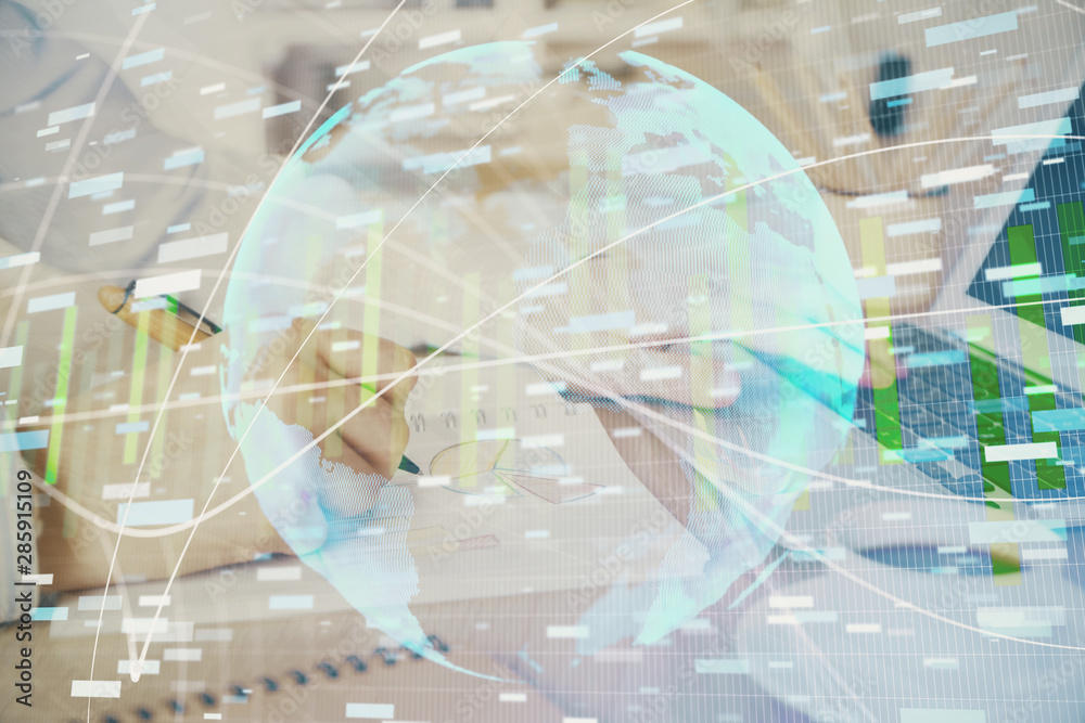 Multi exposure of businessman working on laptop on background. International business hologram in front. Concept of success. Multi exposure of businessman working on laptop on background. International business hologram in front. Concept of success.