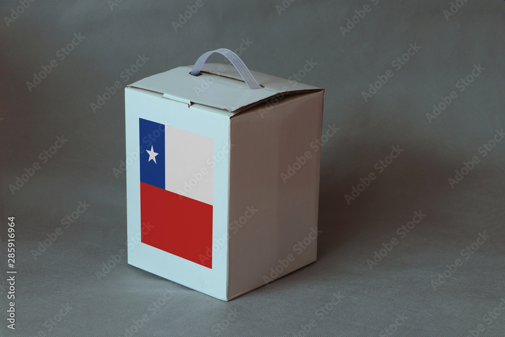 Chile flag on white box, Paper packaging for put products. The concept of Chile export trading. Chile flag on white box, Paper packaging for put products. The concept of Chile export trading.