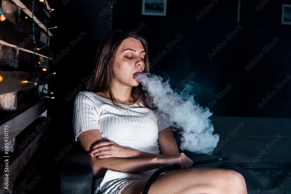 young woman with a hookah