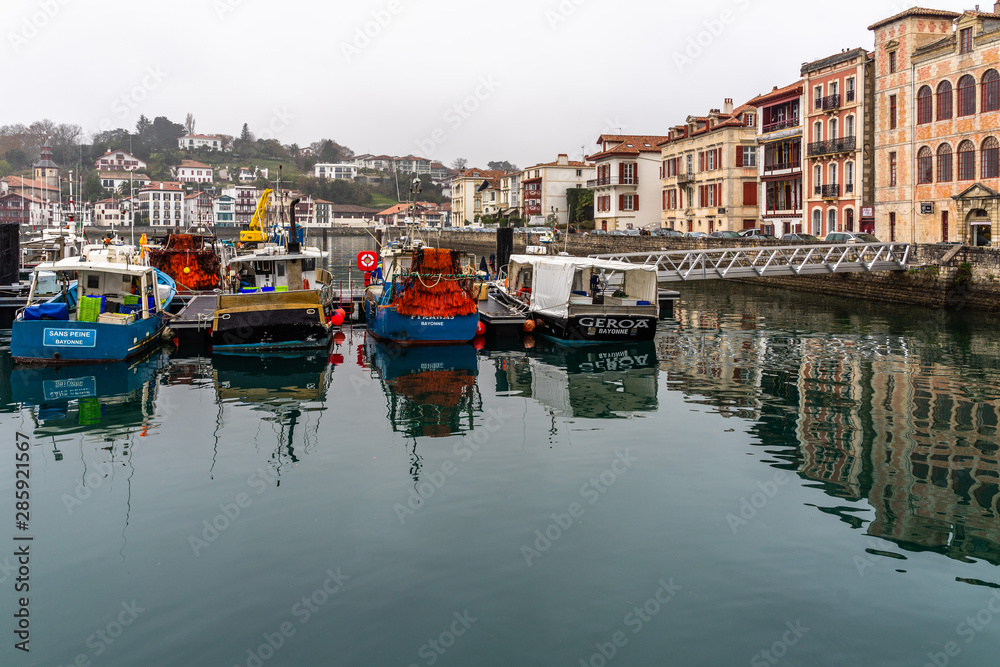 Fishing boats moored at the port of Saint Jean de Luz, a typical resort town on French southern Atlantic coast, France