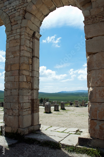 Volubilis Morocco, rural landscape through arches at roman ruins photo