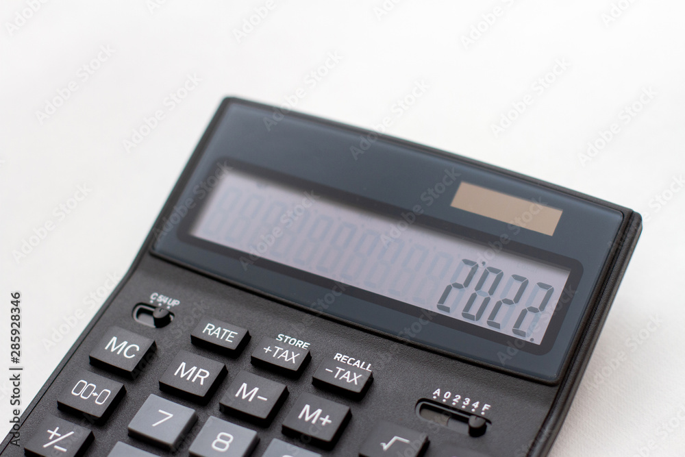 new year 2022 on the display of the calculator. New year concept new year 2022 on the display of the calculator. New year concept