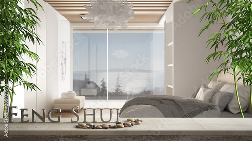 Photography Wooden vintage table shelf with pebble and 3d letters making the word feng shui