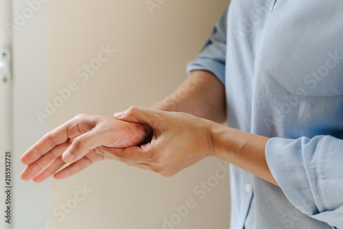 woman wrist arm pain long working. office syndrome healthcare and medicine concept