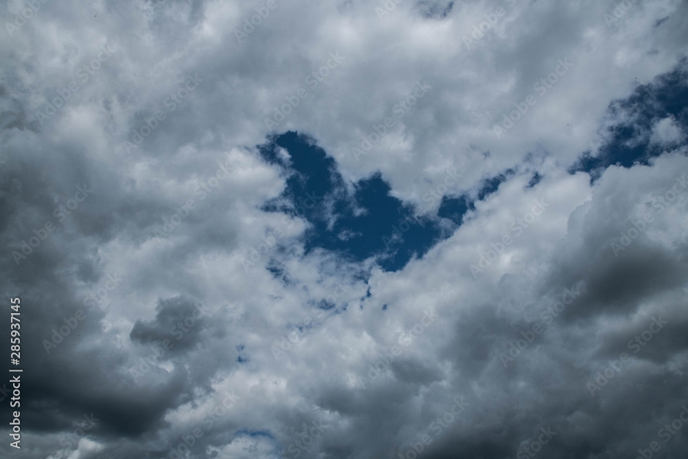 Obraz premium Dramatic cloudy sky, Nature background with stormy clouds, Hope concept.
