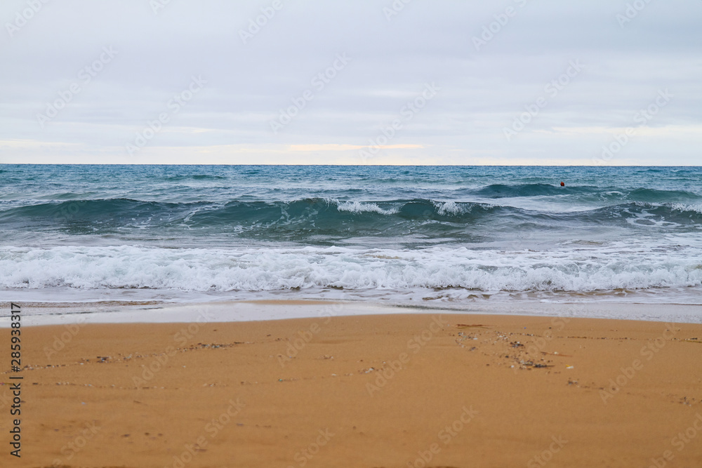 Photo of the sunny summer sandy beach