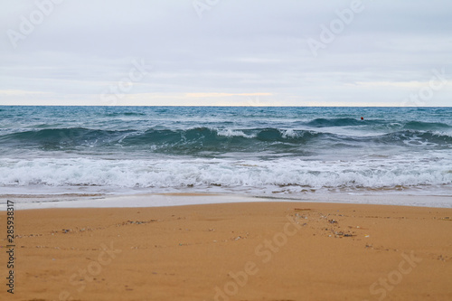 Photo of the sunny summer sandy beach