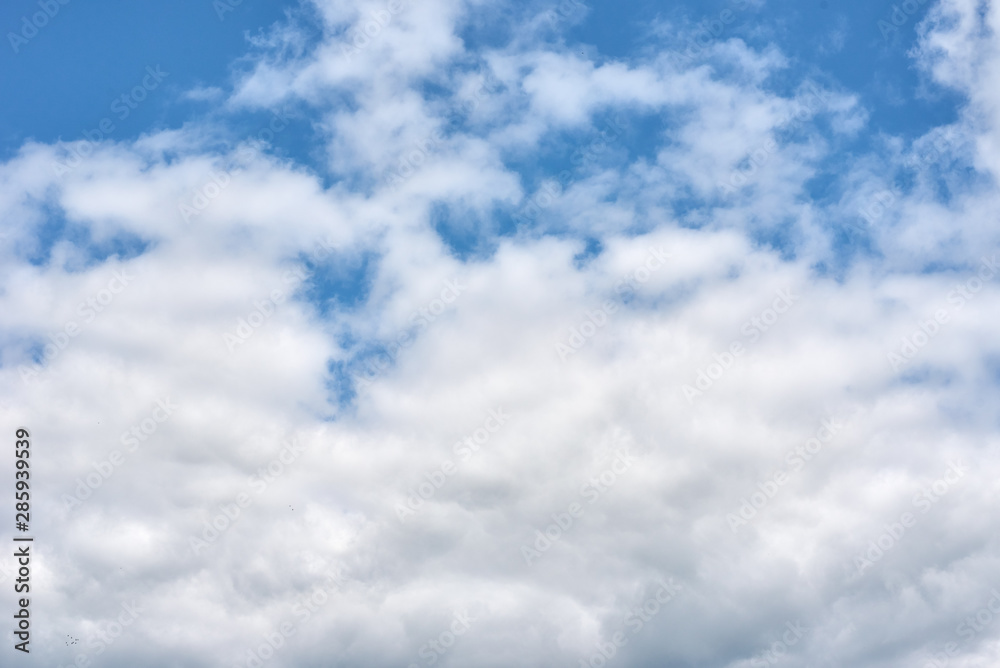 Blue sky with a white clouds, abstract background Blue sky with a white clouds, abstract background