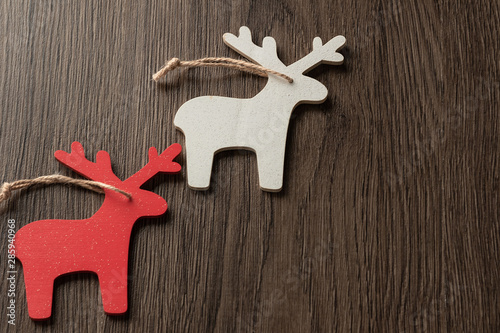 Christmas tree toys traditional wooden deer close-up