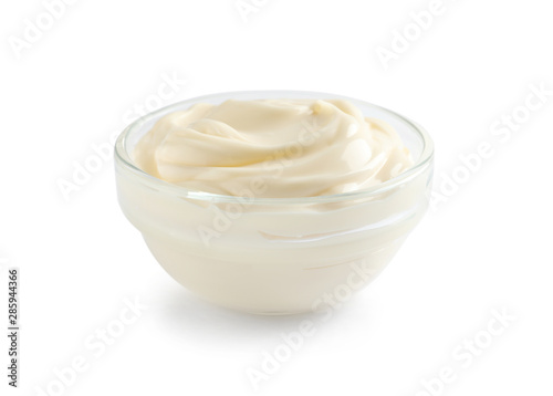 Delicious mayonnaise sauce in bowl on white background
