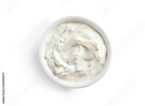 Delicious tartar sauce in bowl on white background, top view