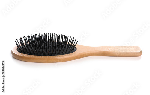 New wooden hair brush on white background