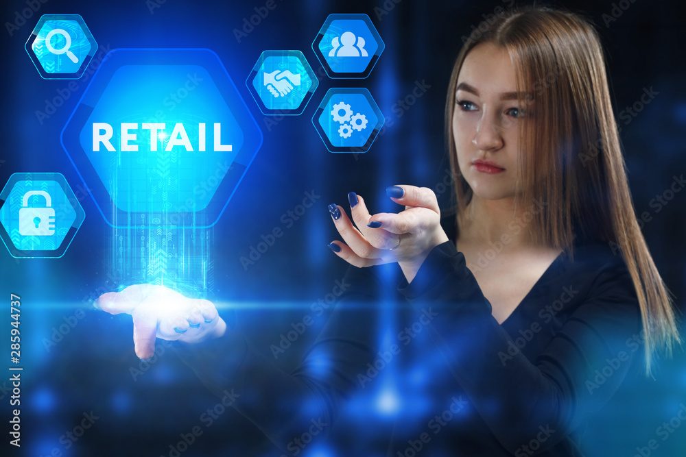The concept of business, technology, the Internet and the network. A young entrepreneur working on a virtual screen of the future and sees the inscription: Retail The concept of business, technology, the Internet and the network. A young entrepreneur working on a virtual screen of the future and sees the inscription: Retail