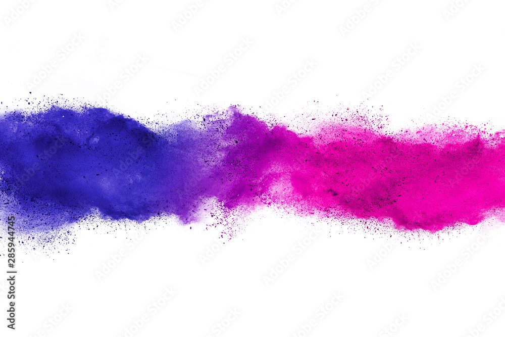 Obraz premium Abstract powder splatted background. Colorful powder explosion on white background. Colored cloud. Colorful dust explode. Paint Holi.