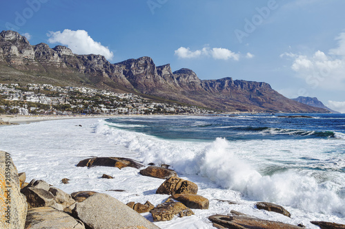 sea and mountains (12 apostles) at Camps Bay or Kampsbaai, suburb of Cape Town on sunny day