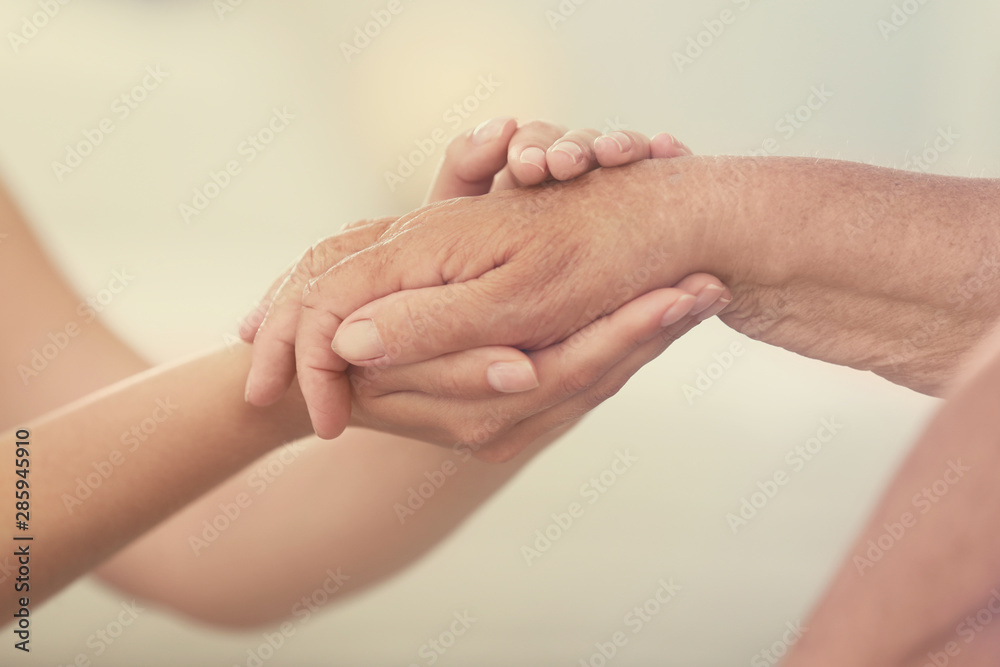 Fototapeta premium People, care and support. Giving helping hand concept