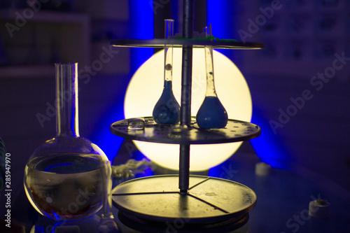 Silhouettes of flasks and tubes in the laboratory. © andreysha74