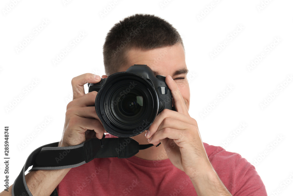Young professional photographer taking picture on white background Young professional photographer taking picture on white background