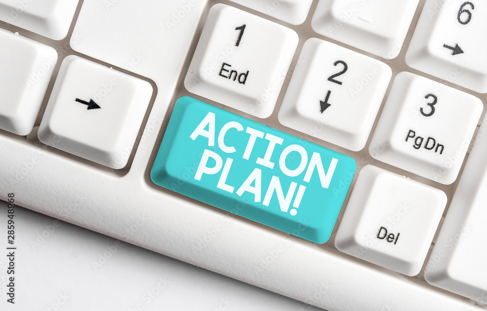 Conceptual hand writing showing Action Plan. Concept meaning proposed strategy or course of actions for certain time White pc keyboard with note paper above the white background Conceptual hand writing showing Action Plan. Concept meaning proposed strategy or course of actions for certain time White pc keyboard with note paper above the white background