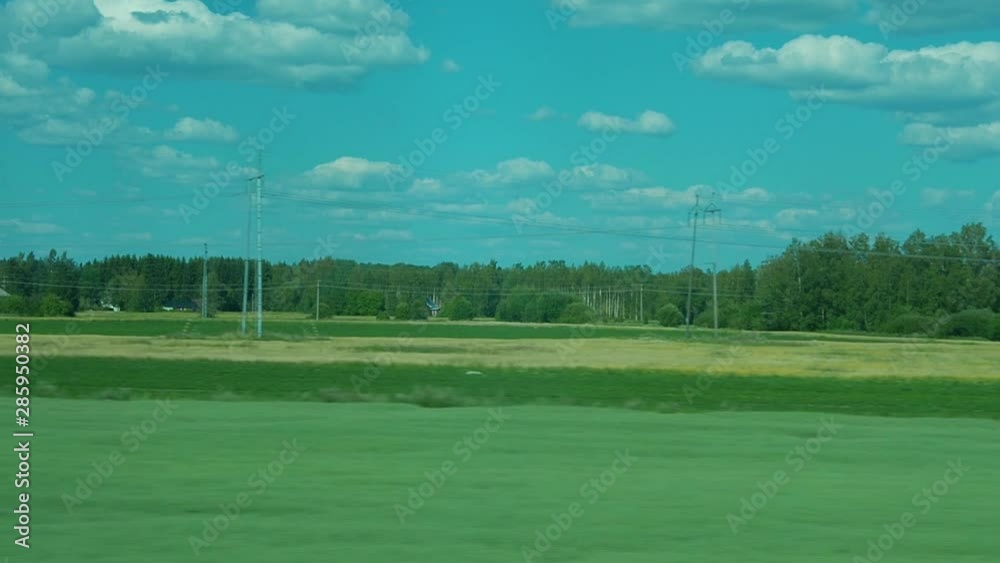 Travel with train in village. Windows seat. View from inside. Houses, trees, forest and fields. Travel with train in village. Windows seat. View from inside. Houses, trees, forest and fields.