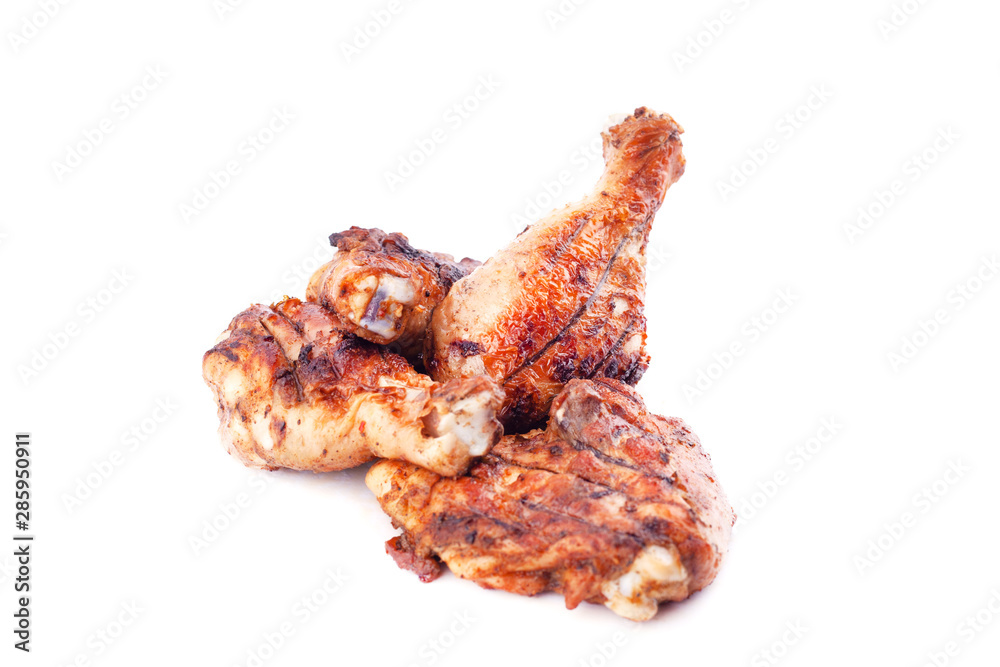 grilled chicken legs isolate on a white background grilled chicken legs isolate on a white background